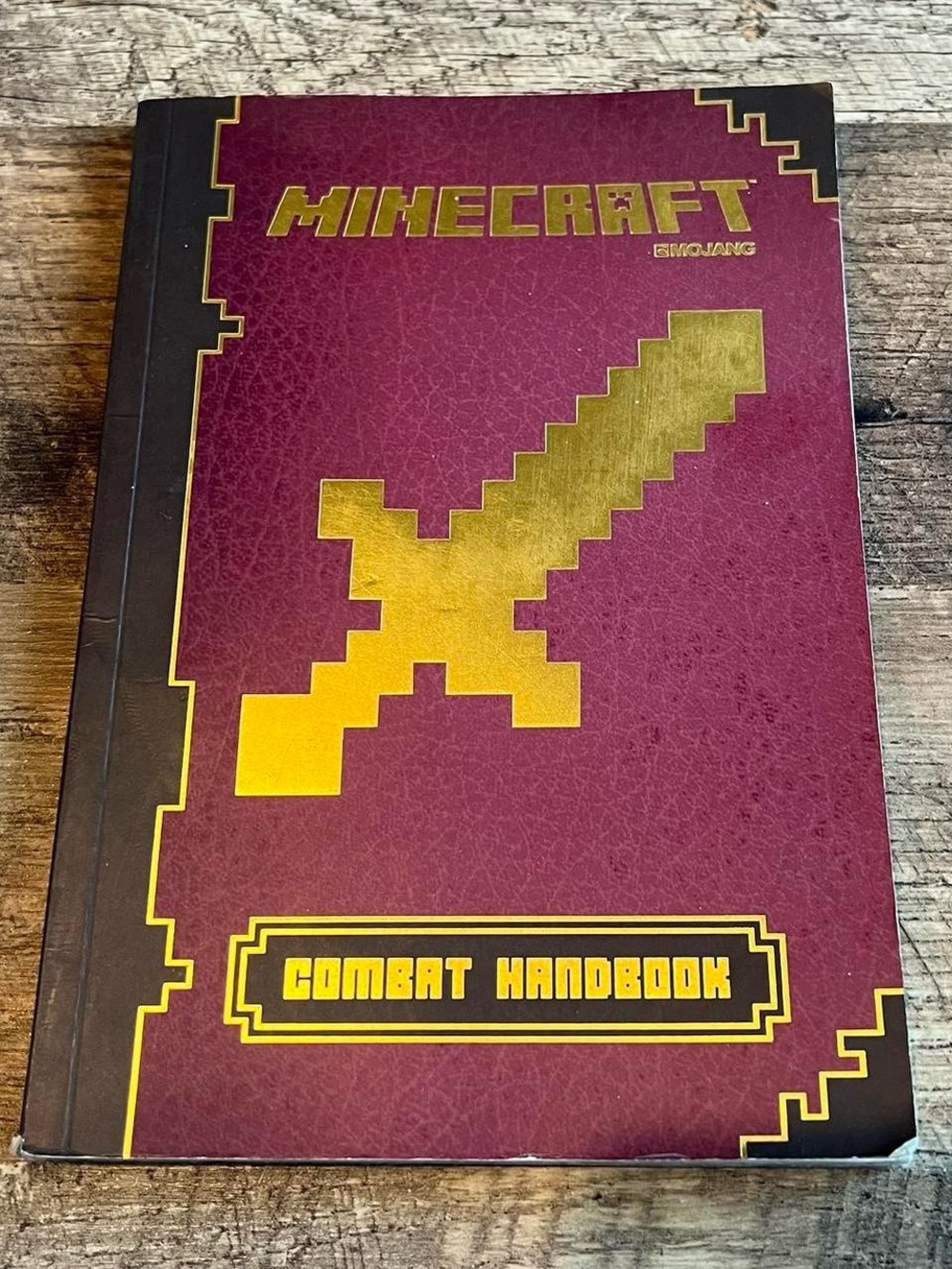 Minecraft Combat Handbook by Scholastic
